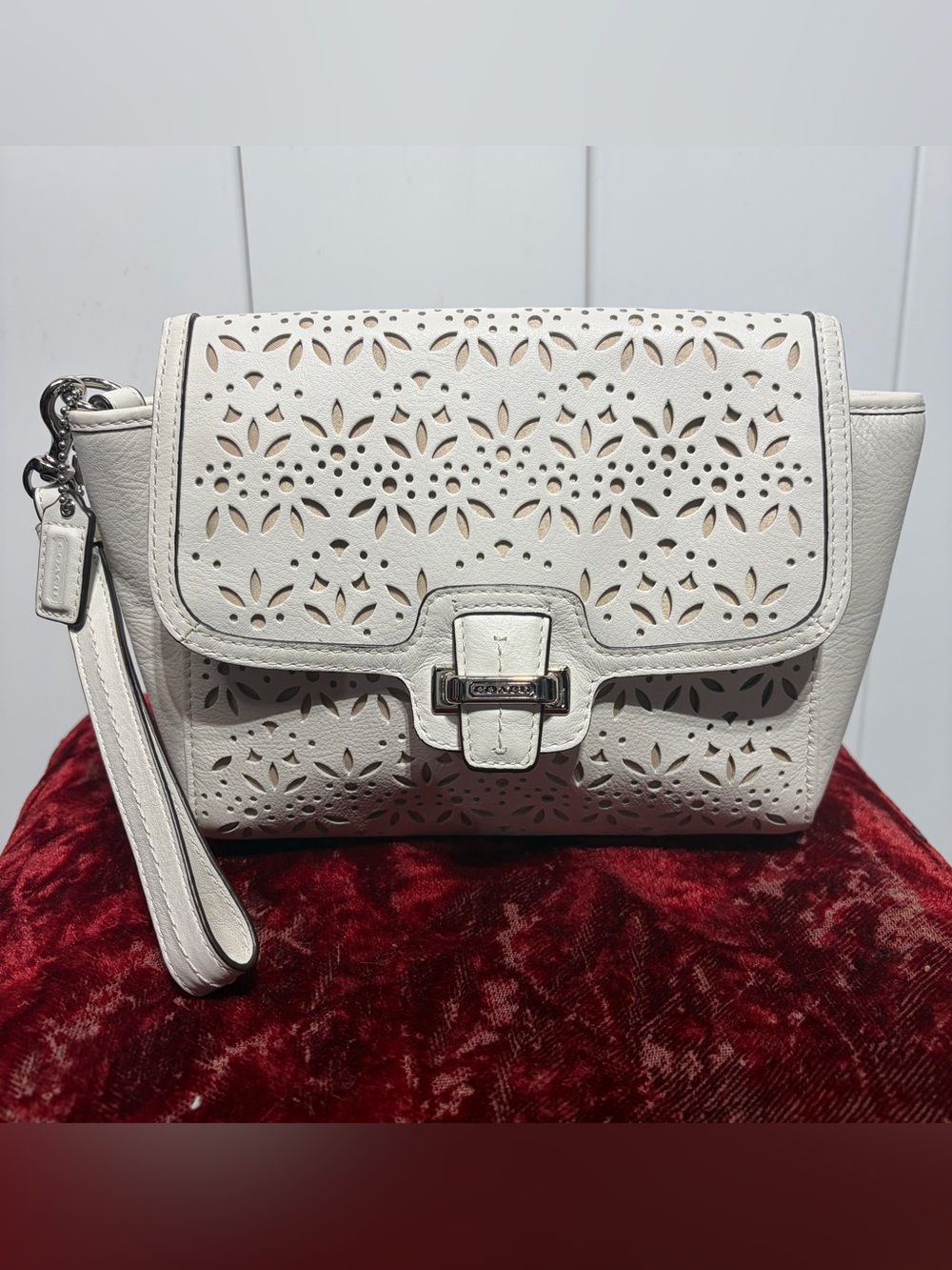 Coach Taylor white leather laser cut floral pattern
